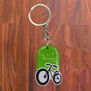 Life is beautiful ride Key Chain